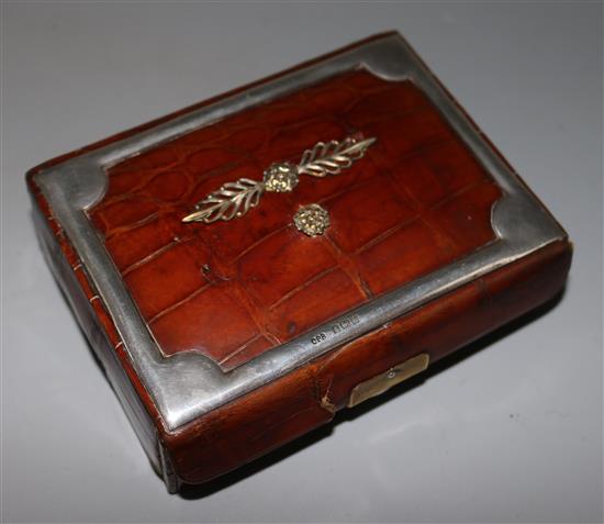 A silver mounted crocodile skin box